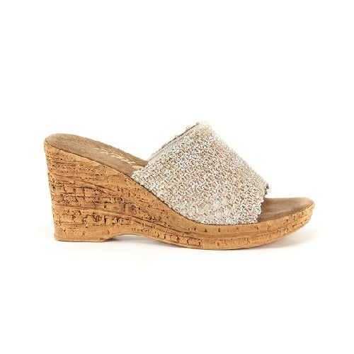 Slip on wedge with weave pattern in natural straw.