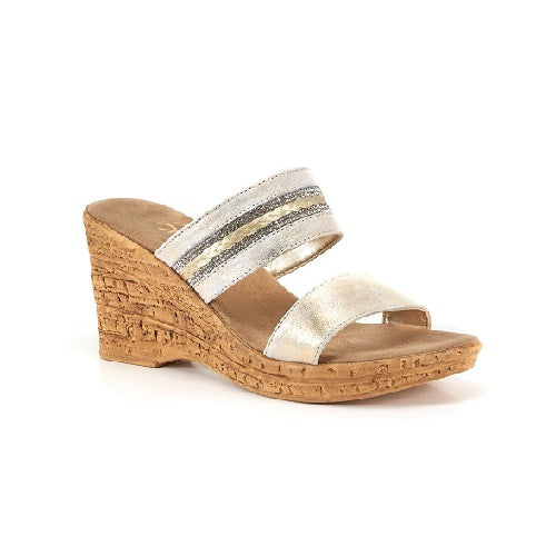 Two strap high heel slide in platinum with cork wedge.