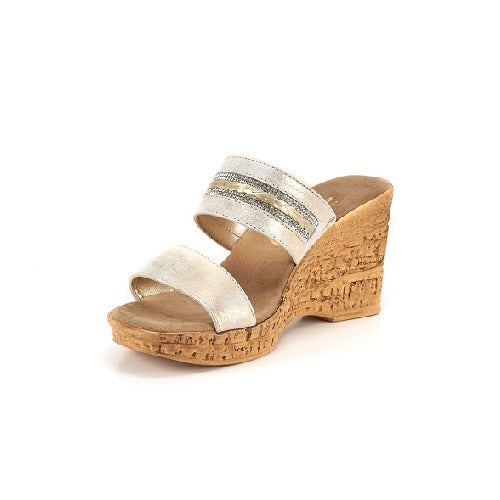 Two strap high heel slide in platinum with cork wedge.