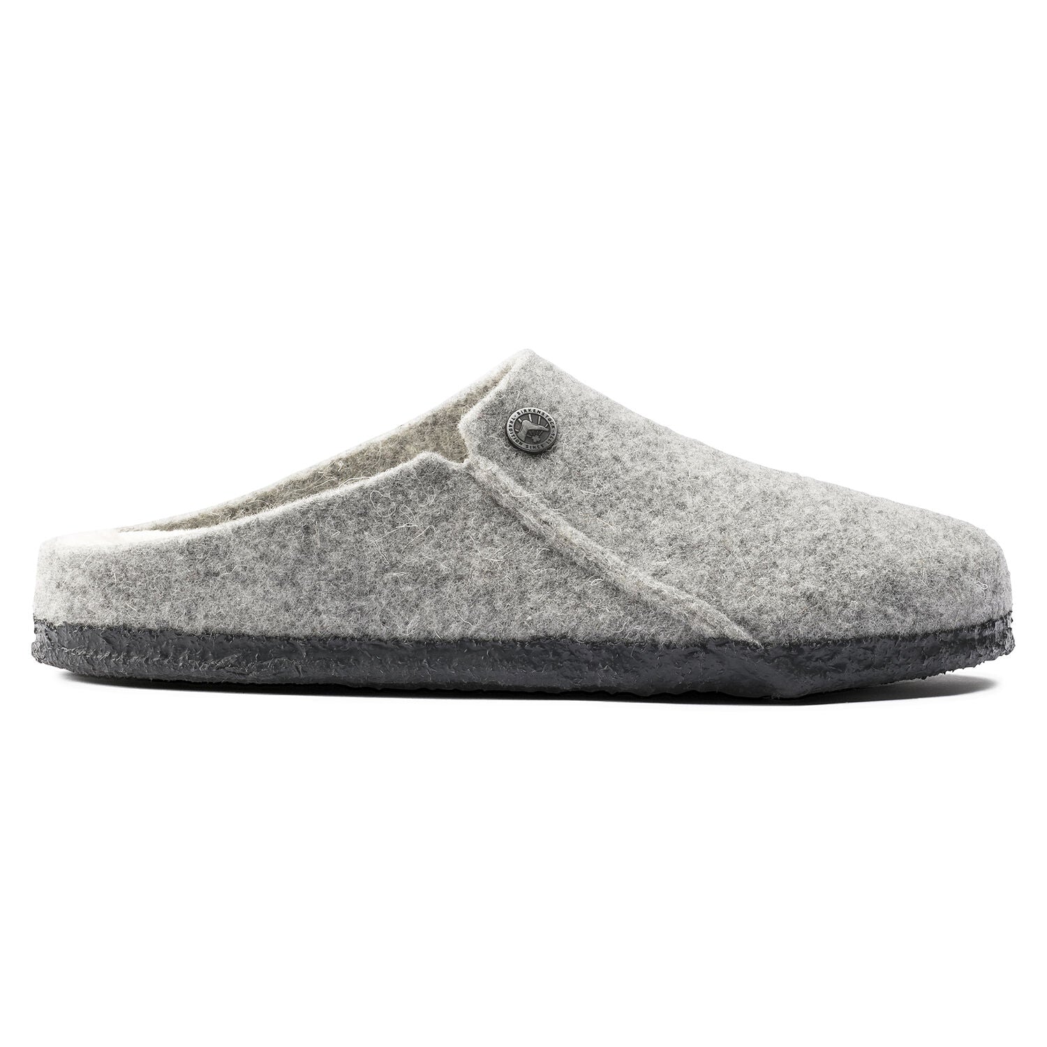 Closed toe slipper in light grey.